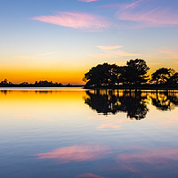 Buy canvas prints of A Wide Perspective of a Sunset Over Hatchet Pond by Gordon Dimmer