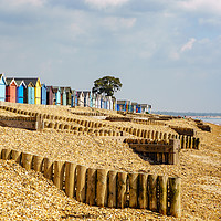 Buy canvas prints of Colourful Beach Huts at Calshot by Gordon Dimmer