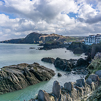 Buy canvas prints of Rocks on Coast near Ilfracombe Harbour by Gordon Dimmer