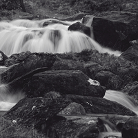 Buy canvas prints of Waterfall at Pen-y-Gwryd by Paul Brewer