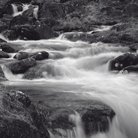 Buy canvas prints of River at Pen-y-Gwryd in Snowdonia National Park by Paul Brewer