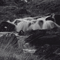 Buy canvas prints of Waterfall at Pen-y-Gwryd, Snowdonia National Park  by Paul Brewer