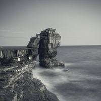 Buy canvas prints of Pullpit Rock at Sunset by Paul Brewer