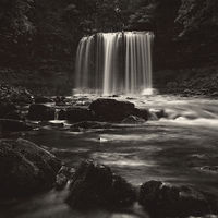Buy canvas prints of Sgwd yr Eira, Falls of Snow in Black and White by Paul Brewer