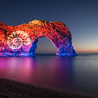 Buy canvas prints of Durdle Door illuminated at night by Paul Brewer