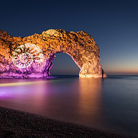 Buy canvas prints of Durdle Door at Night with Illumination by Paul Brewer