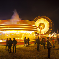 Buy canvas prints of Carousel and Ferris Wheel at night by Paul Brewer
