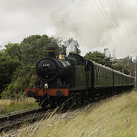 Buy canvas prints of GWR 56XX class 0-6-2T no. 6695 Leaves Corfe Castle by Paul Brewer