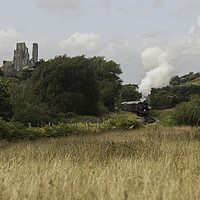 Buy canvas prints of Steam Train Leaves Corfe Castle Station by Paul Brewer