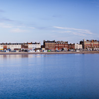 Buy canvas prints of Weymouth Seafront Panoramic by Paul Brewer