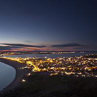 Buy canvas prints of Portland at night looking towards Weymouth by Paul Brewer