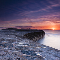 Buy canvas prints of Sunrise over The Cobb Lyme Regis  by Paul Brewer