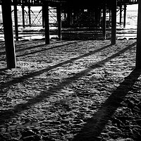 Buy canvas prints of Under the Pier by Paul Brewer