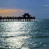 Buy canvas prints of Sunset Fishing on the Pier by Elaine Manley