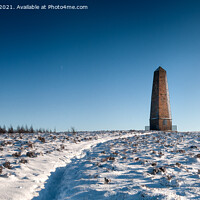 Buy canvas prints of Captain Cook's Monument Yorkshire Moors in snow by Greg Marshall