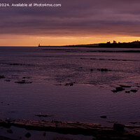 Buy canvas prints of Tynemouth Lighthouse sunset from Whitley Bay by Greg Marshall