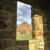 Buy canvas prints of  Roseberry Topping through the shooting lodge by Greg Marshall