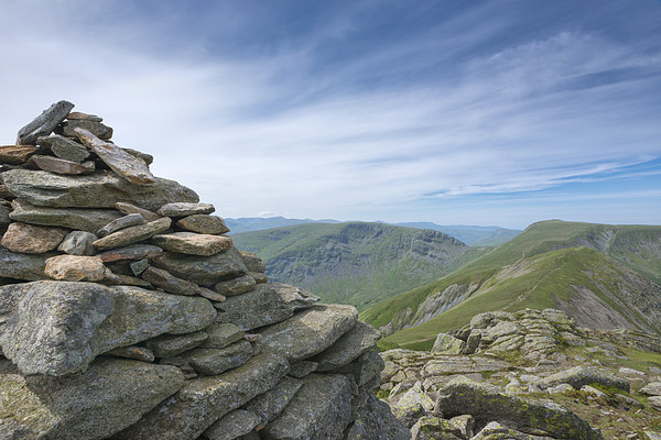 Summit cairn Ill Bell mountain Lake District Picture Board by Greg Marshall