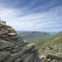Buy canvas prints of Summit cairn Ill Bell mountain Lake District by Greg Marshall