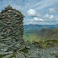 Buy canvas prints of Dale Head summit cairn, Newlands Horseshoe, Lake D by Greg Marshall