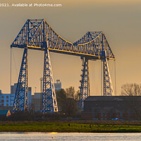 Buy canvas prints of The Transporter Bridge Middlesbrough over River Tees at sunset by Greg Marshall