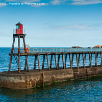 Buy canvas prints of Whitby East Lighthouse and jetty, North Yorkshire by Greg Marshall