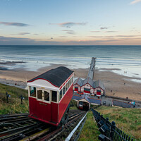 Buy canvas prints of Saltburn Pier and Saltburn Funicular Railway at sunset  by Greg Marshall