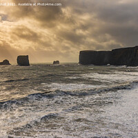 Buy canvas prints of Stormy seas at Dyrhólaey, Iceland by Greg Marshall