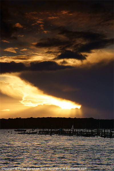 Sun and Cloud over Brownsea Picture Board by Phil Wareham