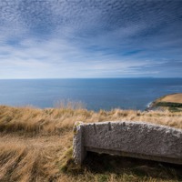 Buy canvas prints of Clifftop Seat by Phil Wareham