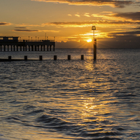 Buy canvas prints of Sunrise at Boscombe by Phil Wareham