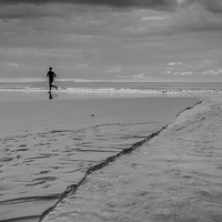 Buy canvas prints of  Jogging on the beach by Phil Wareham
