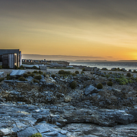 Buy canvas prints of  Huts and Rocks by Phil Wareham