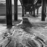 Buy canvas prints of  Under the Pier by Phil Wareham