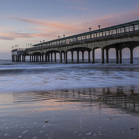 Buy canvas prints of  Early at Boscombe Pier by Phil Wareham