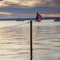 Buy canvas prints of  Red sail at sunset by Phil Wareham