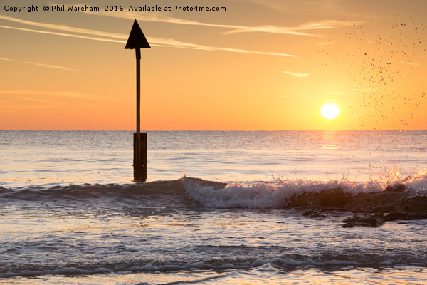 Sunrise at Sandbanks Picture Board by Phil Wareham