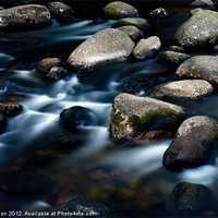 Buy canvas prints of Rocks in the river Dart by Andy dean