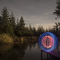Buy canvas prints of light orb at South Barrule Plantation by Daniel Chambers