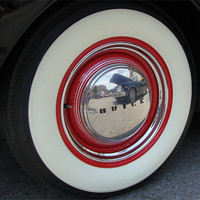 Buy canvas prints of Buick Hubcap by Donna-Marie Parsons