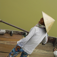 Buy canvas prints of Mekong River Lady Vietnam by Luke Newman