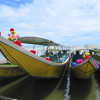 Buy canvas prints of Thai Long Tail Boats by Luke Newman
