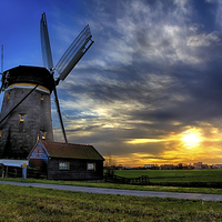 Buy canvas prints of  Beautiful sunrise over a windmill by Ankor Light