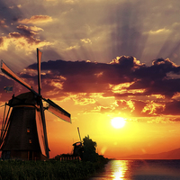 Buy canvas prints of Sunrise beams over the dutch windmills by Ankor Light