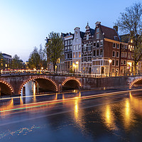 Buy canvas prints of Amsterdam calm canal at the blue sunset hour by Ankor Light