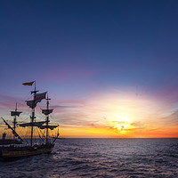 Buy canvas prints of Silhouette of a pirate ship leaving the harbor by Ankor Light