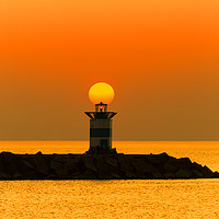 Buy canvas prints of Sunset on the lighthouse by Ankor Light