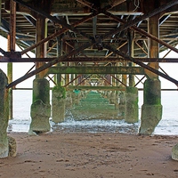 Buy canvas prints of Under Teignmouth Pier by philip milner