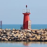Buy canvas prints of  The Red Lighthouse by philip milner
