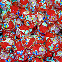 Buy canvas prints of Red Glass Marbles by philip milner